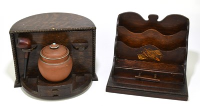 Lot 102 - An early 20th century revolving smoker's box...