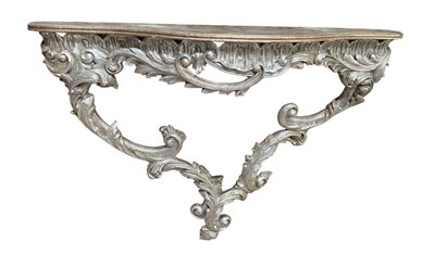 Lot 1103 - A modern silver serpentine fronted console...