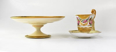 Lot 332 - A Limoges cream and gilt tazza with painted...