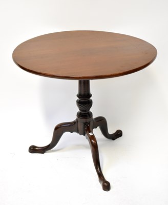 Lot 24 - A George III mahogany tilt-top breakfast table...