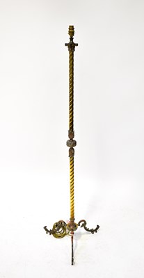 Lot 130 - A 19th century brass standard lamp in the form...