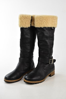 Lot 935 - UGG, AUSTRALIA; a pair of black leather...