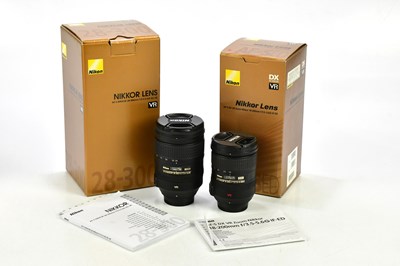 Lot 486 - NIKON; two Nikkor lenses, comprising a...