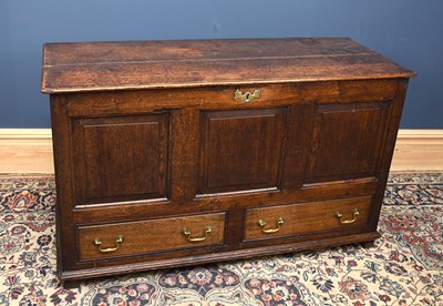 Lot 2971 - An 18th century oak coffer with panelled front...