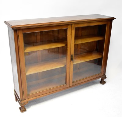 Lot 65 - An early 20th century mahogany glazed bookcase,...