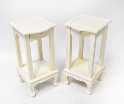 Lot 85 - A pair of white painted single-drawer night...