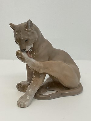 Lot 225 - ROYAL COPENHAGEN; a porcelain figure of a puma...