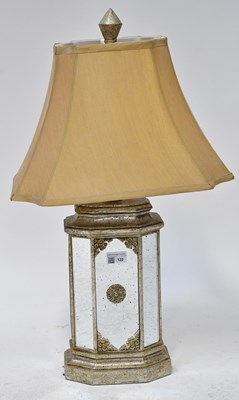 Lot 122 - A silvered and mirrored table lamp, height 70cm.