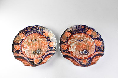 Lot 171 - A pair of Imari pattern shell-shaped shallow...