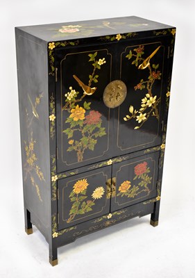 Lot 10 - A 20th century black lacquered cabinet...