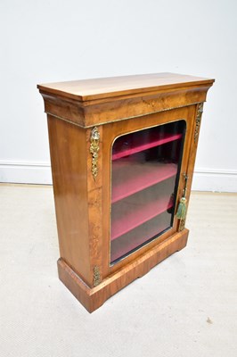 Lot 1014 - A Victorian walnut pier cabinet with applied...