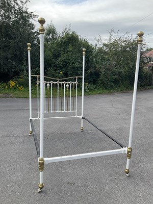 Lot 1044 - A Victorian white painted cast metal and brass...