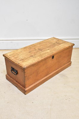Lot 1163 - An old pine blanket chest on plinth base,...
