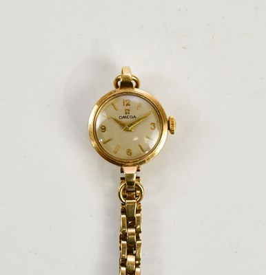 Lot 628 - OMEGA; a 9ct gold cased lady's wristwatch, the...