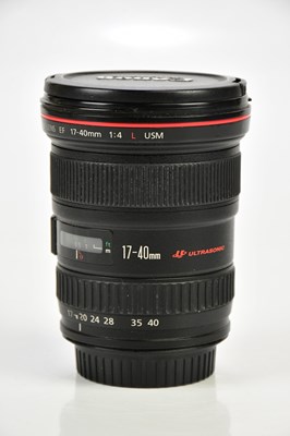 Lot 489 - CANON; a Canon 17mm-40mm f4 L lens, with front...