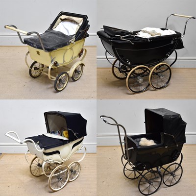 Lot 113 - A collection of four Silver Cross style prams,...