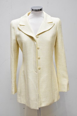 Lot 888 - CHANEL; an unused lemon yellow bouclé long...