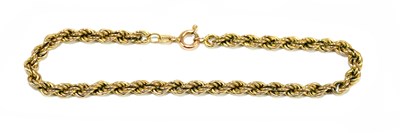 Lot 1279 - A 9ct yellow gold twist link bracelet, length...