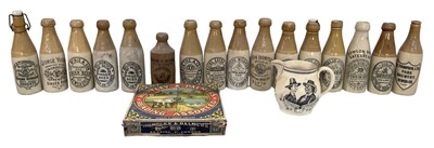 Lot 284 - Sixteen assorted stoneware bottles, ginger...