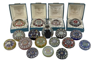 Lot 487 - A collection of paperweights comprising four...