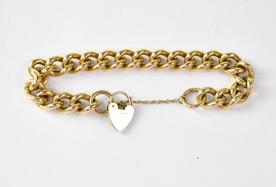 Lot 782 - A 9ct gold bracelet with 9ct gold heart-shaped...