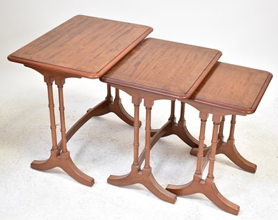 Lot 29 - NATHAN; a nest of three tables, the largest 54...