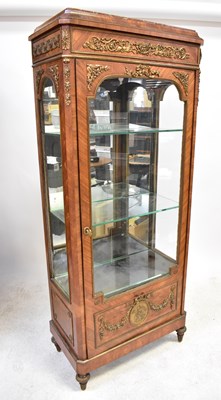 Lot 3 - A Louis XV style vitrine with gilt metal...