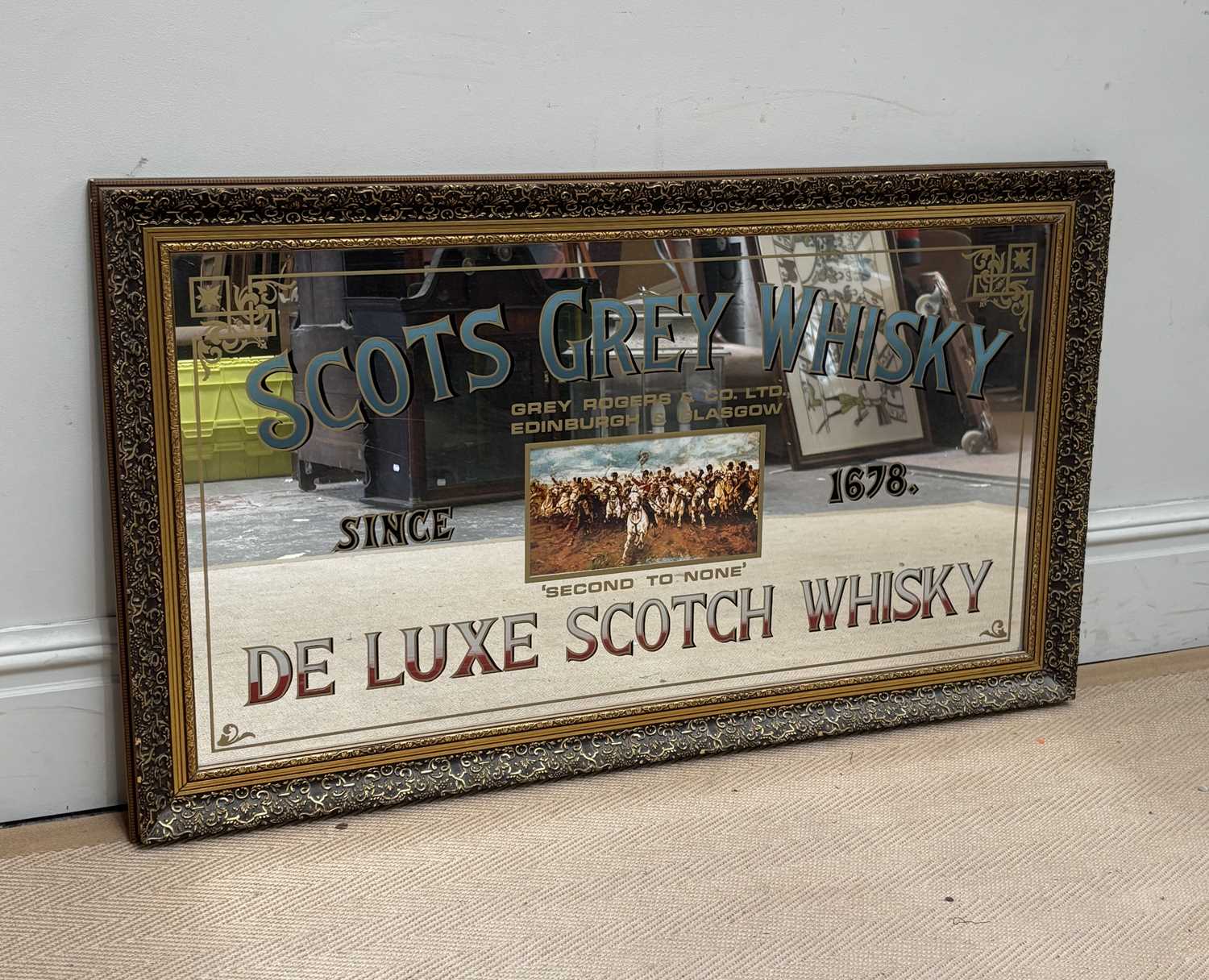 Lot 1442 - A reproduction Scots Grey Whisky advertising...