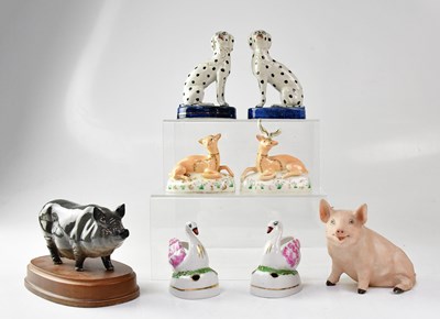 Lot 304 - A collection of porcelain and pottery animals...