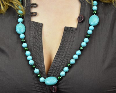 Lot 1127 - A turquoise and pearl necklace with silver...