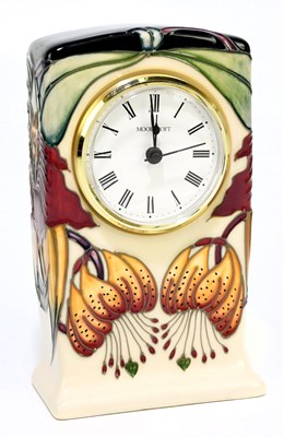 Lot 99 - NICOLA SLANEY FOR MOORCROFT; a mantel clock...