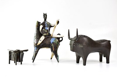 Lot 379 - A 20th century bronze model of a stylised bull,...