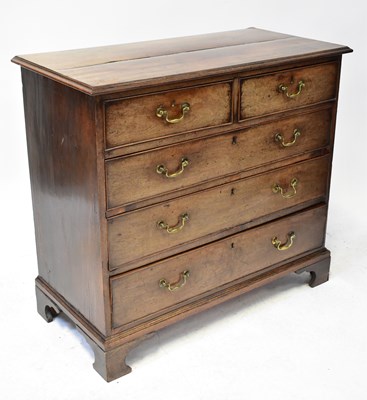 Lot 39 - A George III walnut chest of two short over...