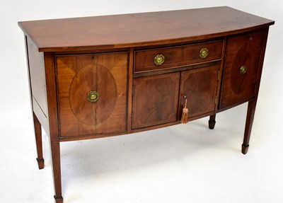 Lot 50 - An Edwardian mahogany bow-fronted sideboard...