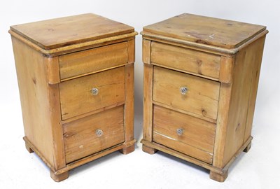 Lot 40 - A pair of Victorian pine bedside three-drawer...