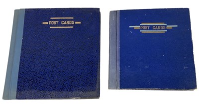 Lot 482 - Two albums of 19th century and later postcards...