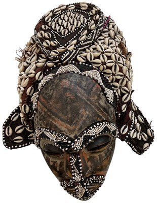 Lot 572 - A Kuba Ngaady a Mwaash mask, with bead and...