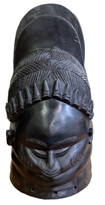 Lot 573 - An African carved wooden Mende mask, height 38cm.