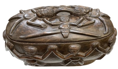 Lot 554 - A Cameroon Bemileke carved wooden container,...