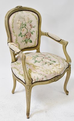 Lot 4 - A Louis XV style fauteuil armchair painted...
