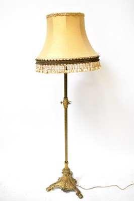 Lot 131 - A 19th century brass standard lamp in the...