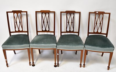 Lot 73 - Four Edwardian mahogany dining chairs with...