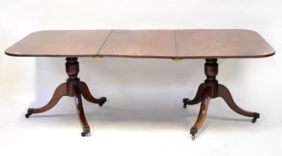 Lot 22 - A George III mahogany D-end dining table with...