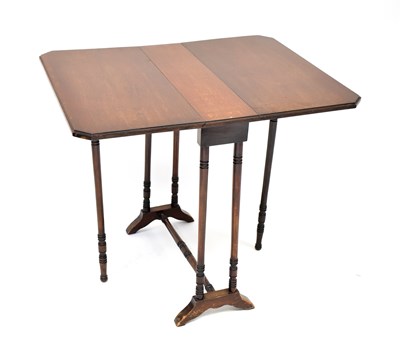 Lot 17 - An Edwardian mahogany Sutherland table on...