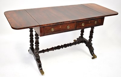 Lot 5 - A William IV rosewood sofa table with a pair...