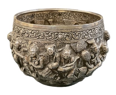 Lot 658 - A white metal Tibetan style bowl, decorated...