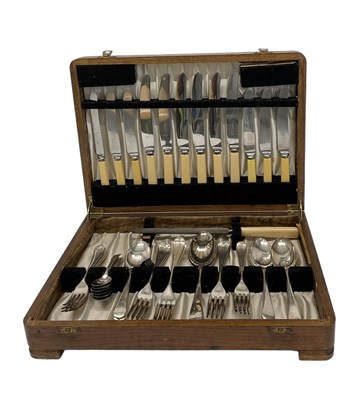 Lot 591 - An oak cased six setting canteen of silver...