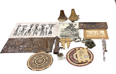 Lot 582 - A group of African items including bronze wall...