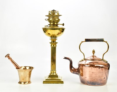 Lot 1572 - A brass oil lamp, with fluted column on...