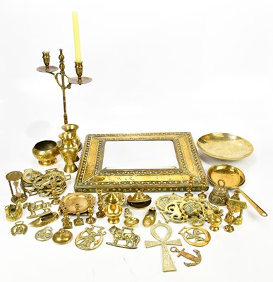 Lot 1562 - A small collection of brassware including...